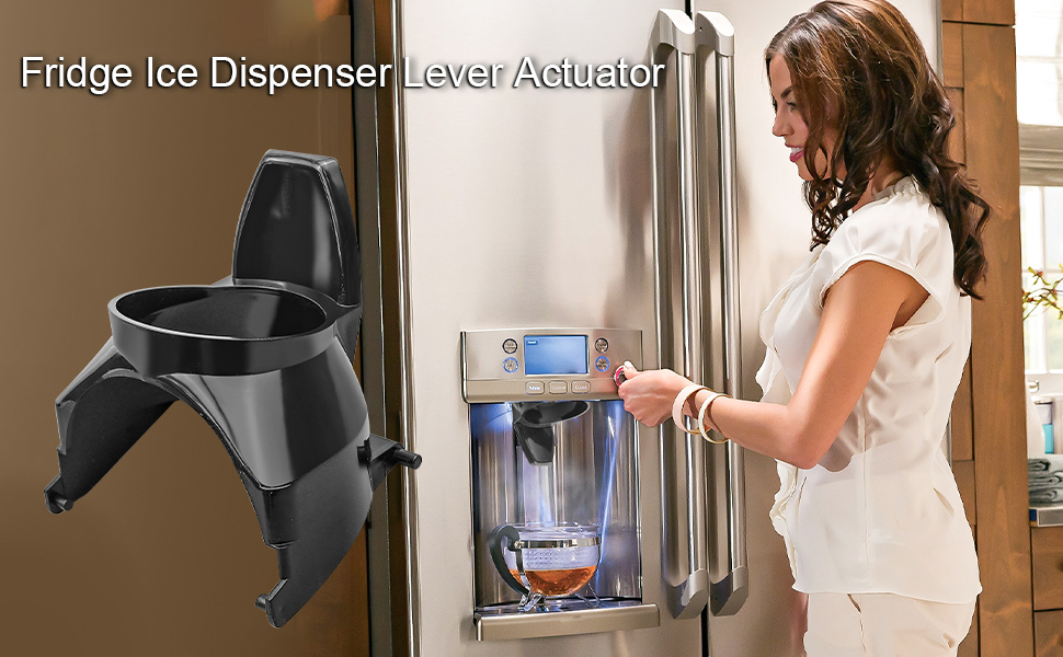 A close-up photo of a refrigerator door water dispenser with a glass held under the spout in a home kitchen