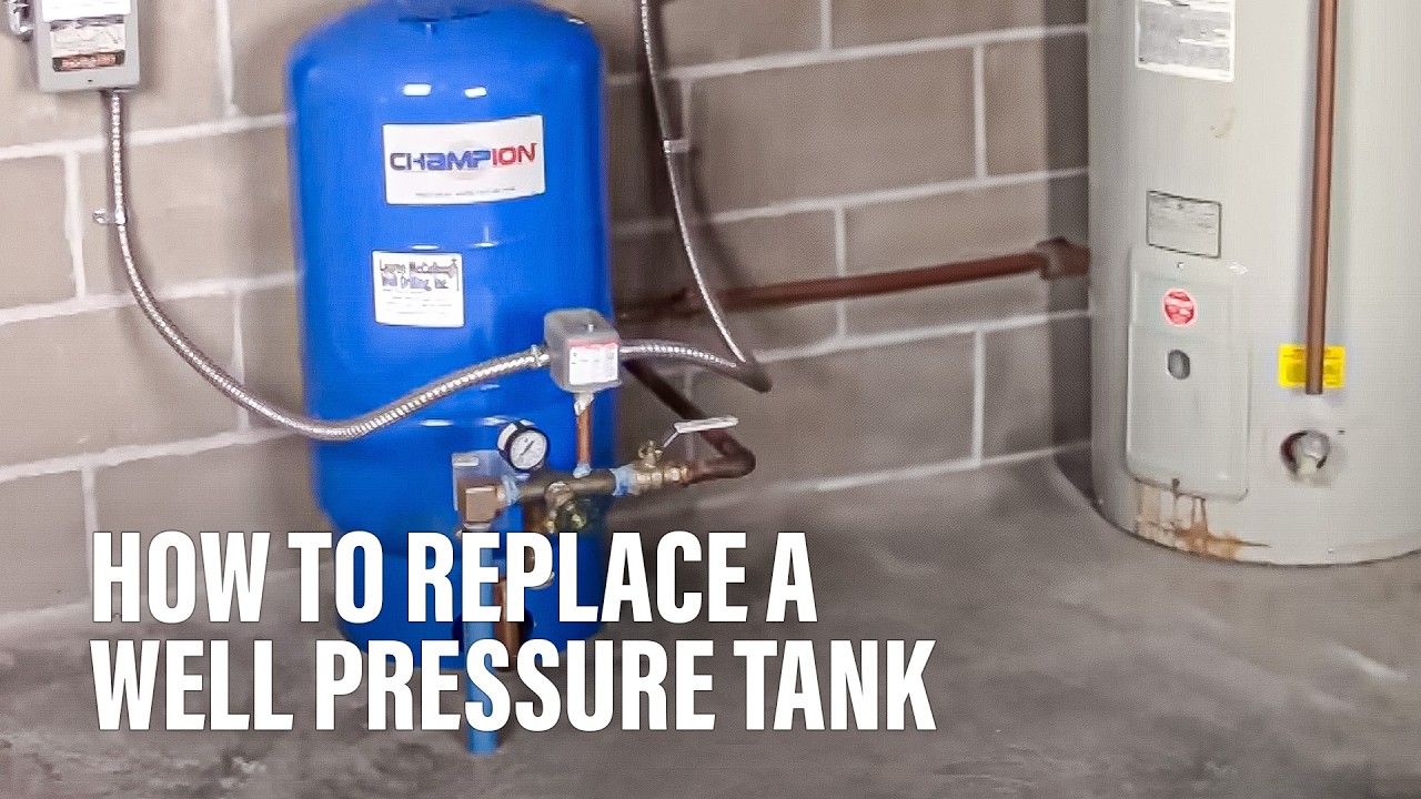 A close up photo of a well pressure switch mounted on plumbing near a pressure tank in a home utility room