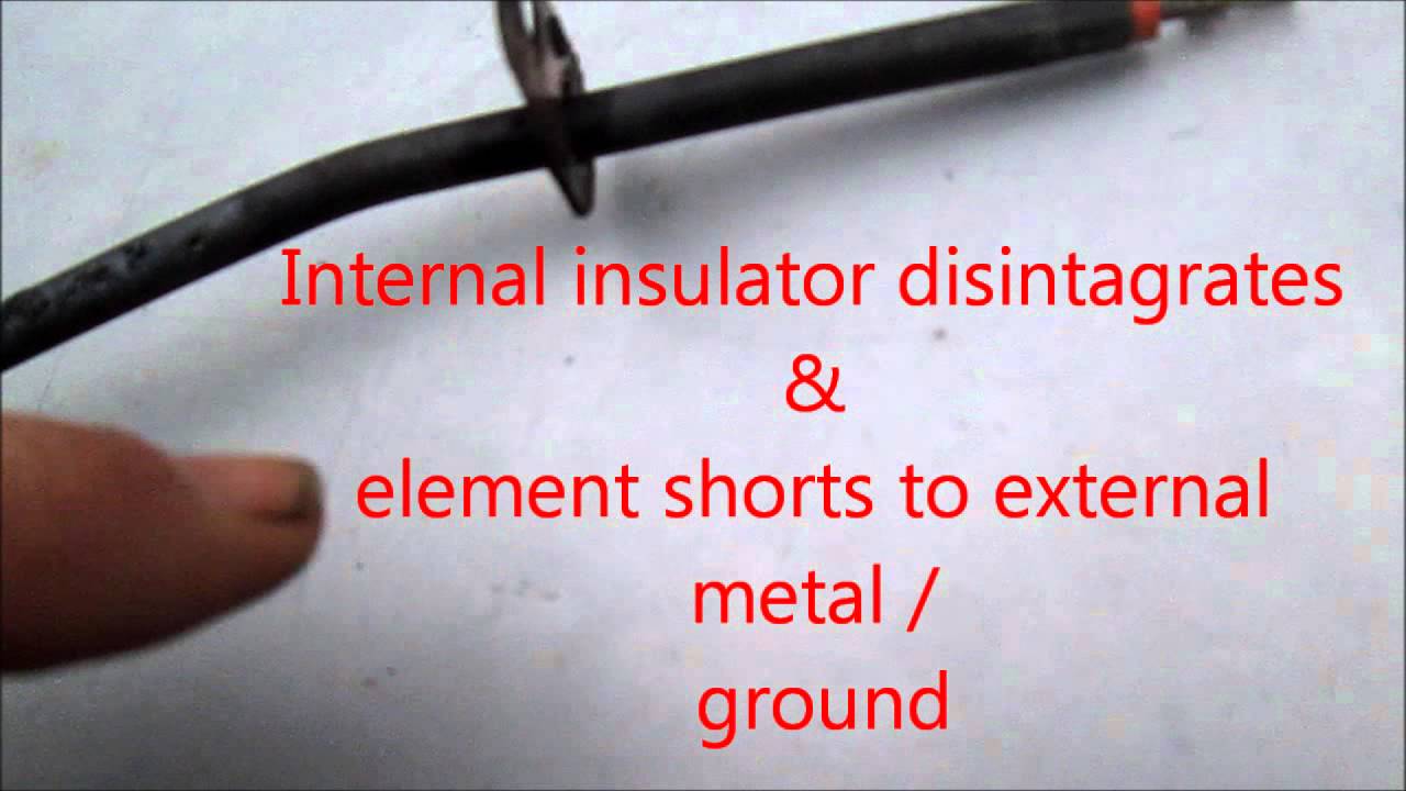 A close-up photo of a worn electric oven bake element with visible blistering and discoloration on the metal surface