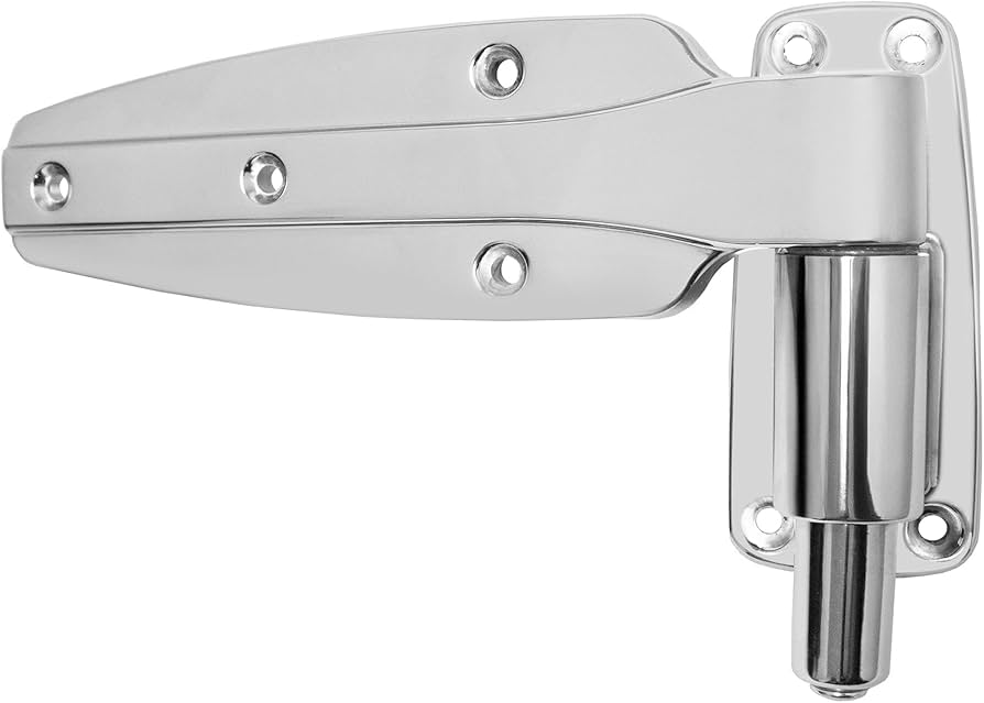 A close-up photo of a worn plastic hinge cam on a bottom-freezer door near the floor