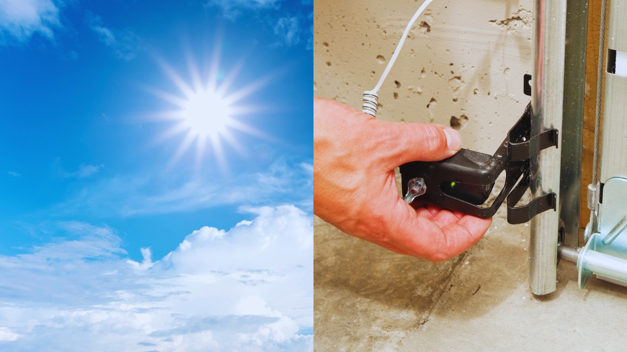 A garage door safety sensor near the floor with a small homemade shade attached above the lens to block sunlight