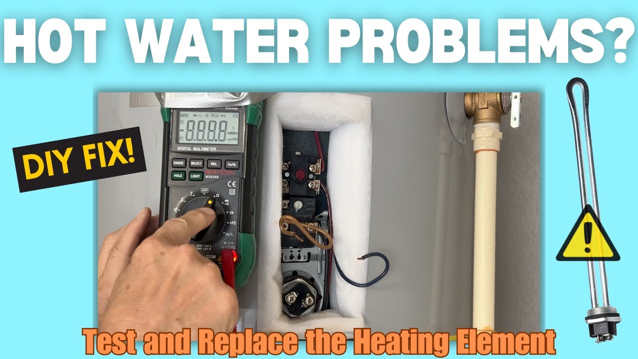 A homeowner standing near an electrical panel with the breaker door open, looking toward a standard tall electric water heater in a garage, natural indoor lighting, real photo