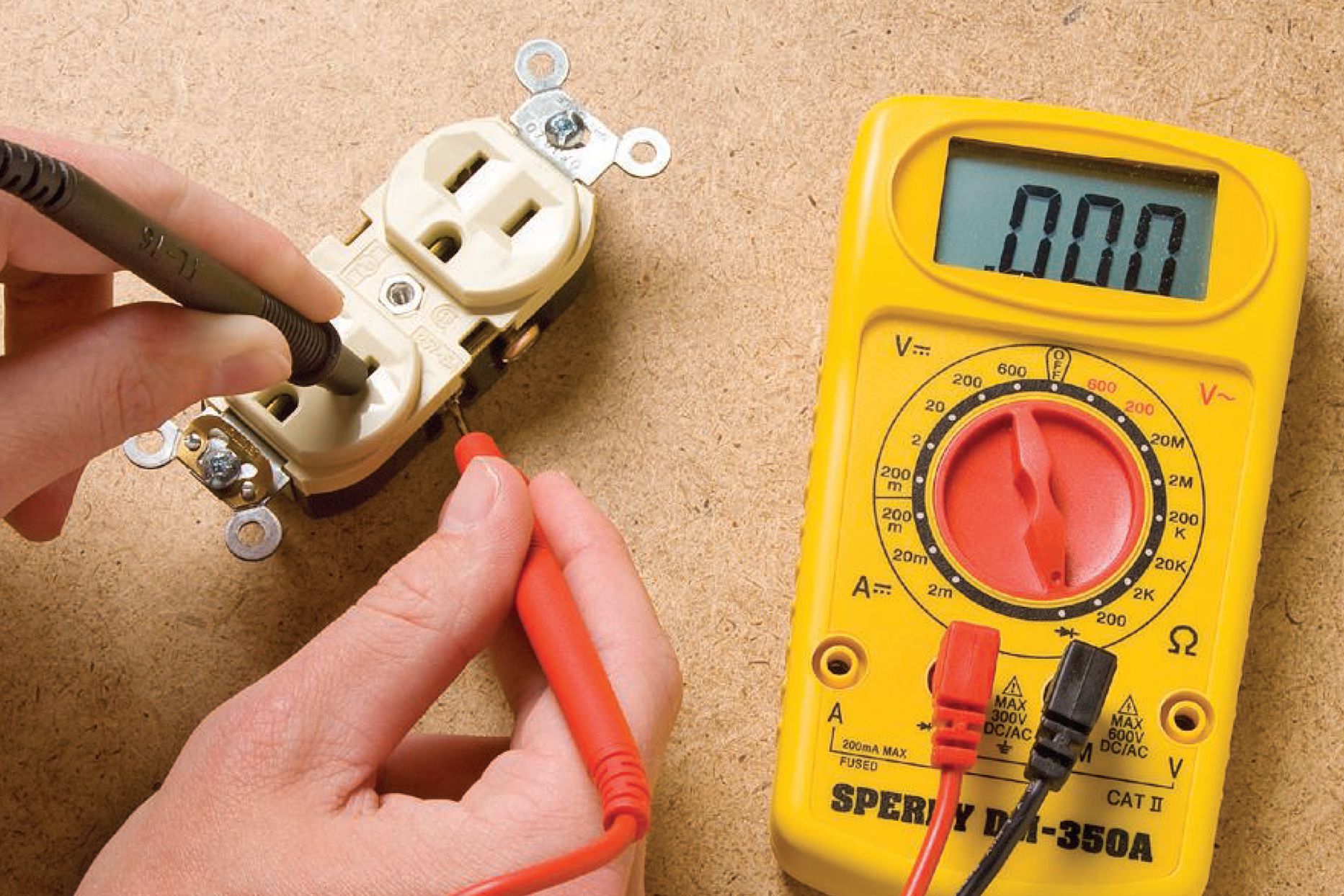 A homeowner using a digital multimeter to test voltage at an outdoor electrical outlet with the breaker on, photographed in a real backyard setting