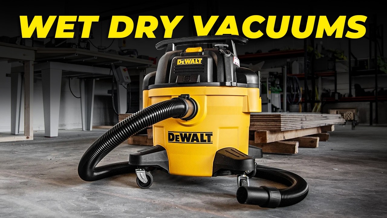 A homeowner using a wet dry vacuum to remove water from a concrete basement floor near a floor drain, with cleaning supplies nearby