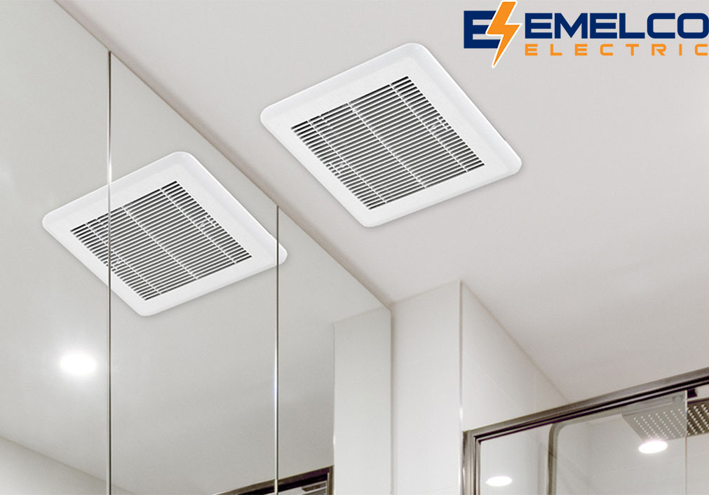 A real bathroom ceiling exhaust fan with the grille removed, the fan housing visible, and the fan running while the wall switch is off, indoor home photo