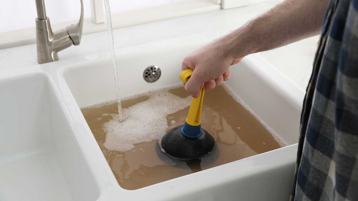 Unclog a Kitchen Sink Without a Plumber