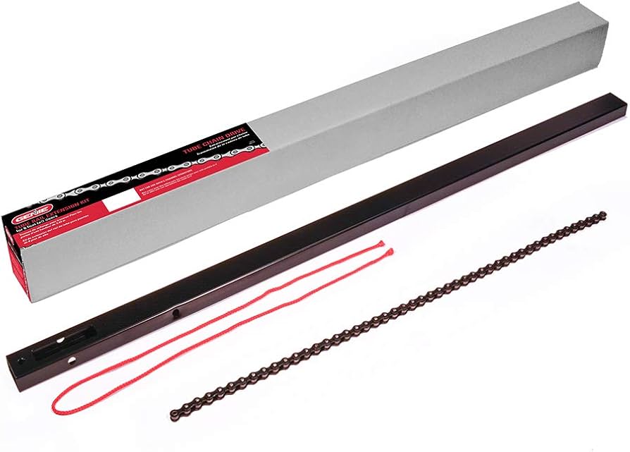 A real photo of a ceiling-mounted garage door opener with a chain drive rail, showing the chain and trolley assembly near the center of the garage ceiling