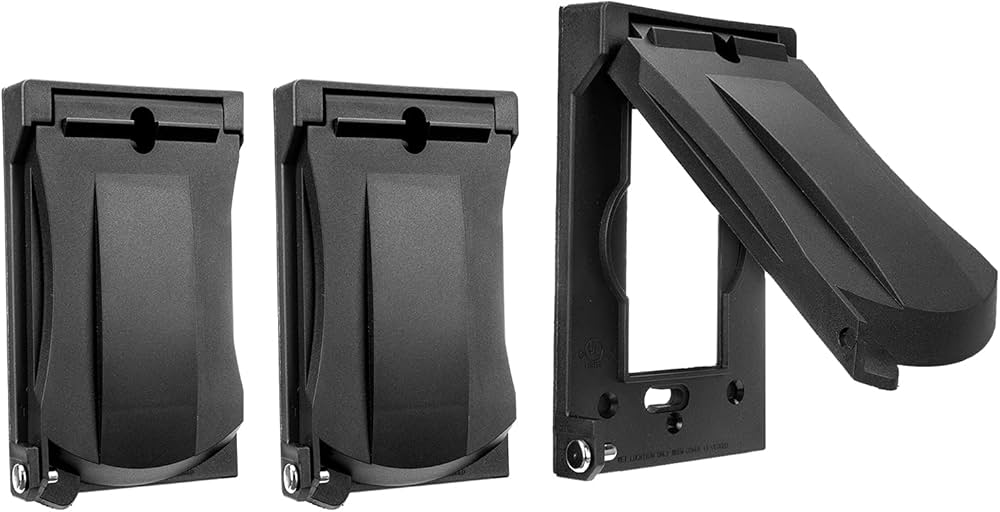 A real photo of an outdoor GFCI outlet on exterior siding with a clear weatherproof in-use cover closed, overcast daylight