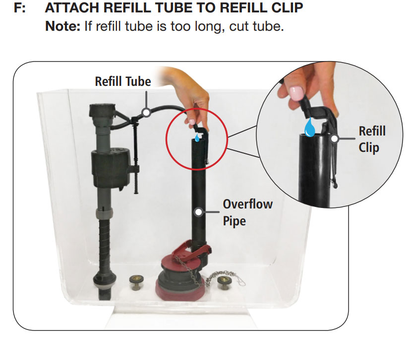 Close-up photo of a toilet fill valve with a small refill tube clipped securely to the overflow pipe inside the tank